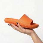 Chinelo slide ortopédico Nuvem da Loja Passato com palmilha anatômica, leve e antiderrapante para conforto unissex.